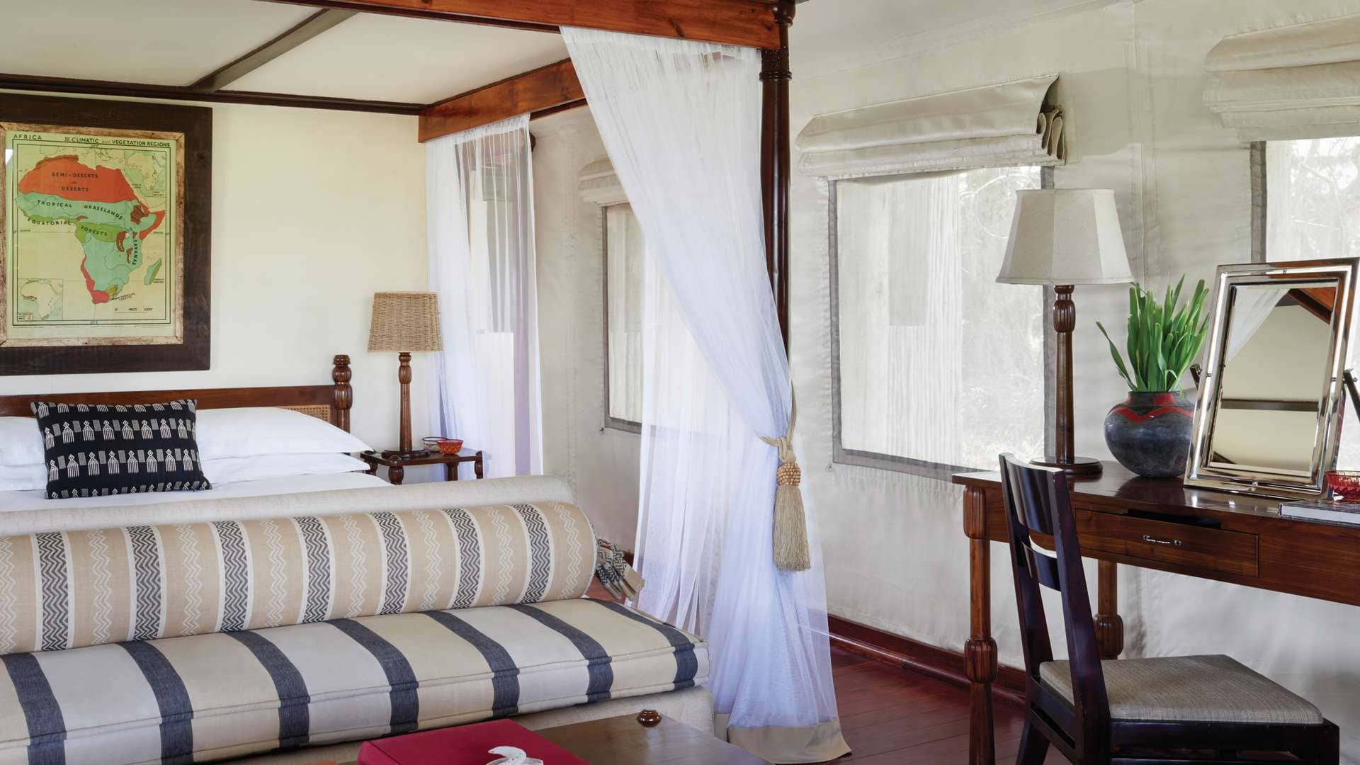 Bedroom with art on the wall, white walls 