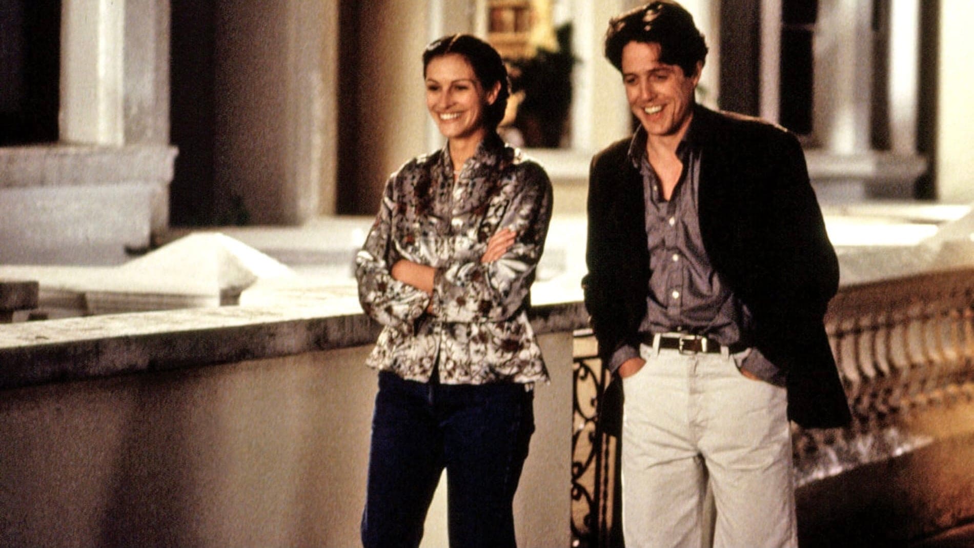 Julia Roberts and Hugh Grant outside The Ritz Hotel in London turning the evening