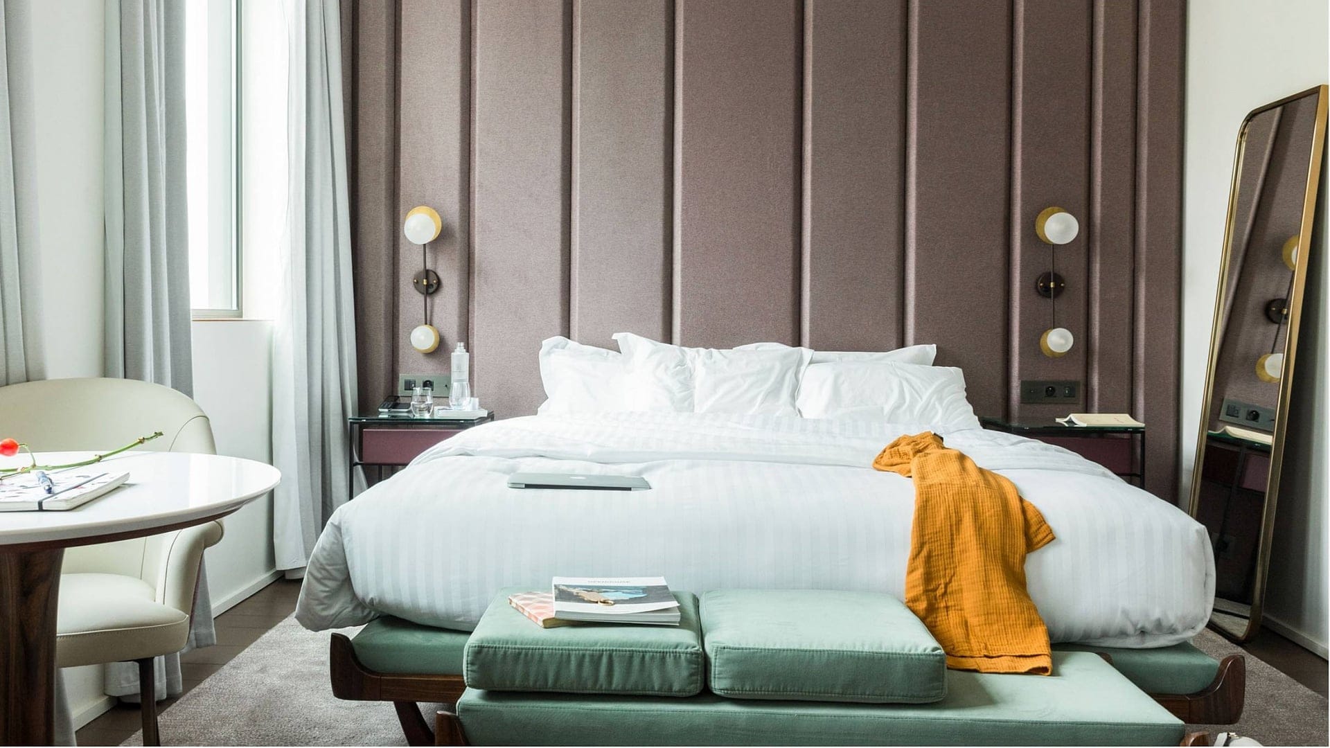 room at maison breguet with a big white king size bed 