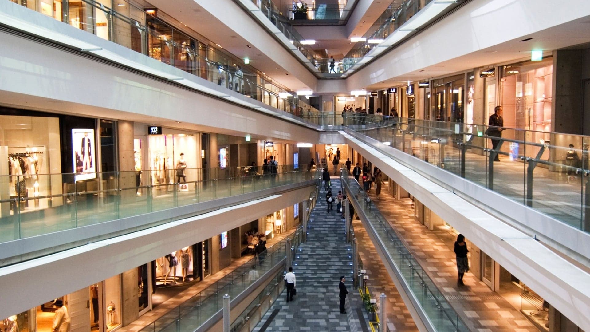 Omotesando Hills with people, stores and middle perspective of the store.