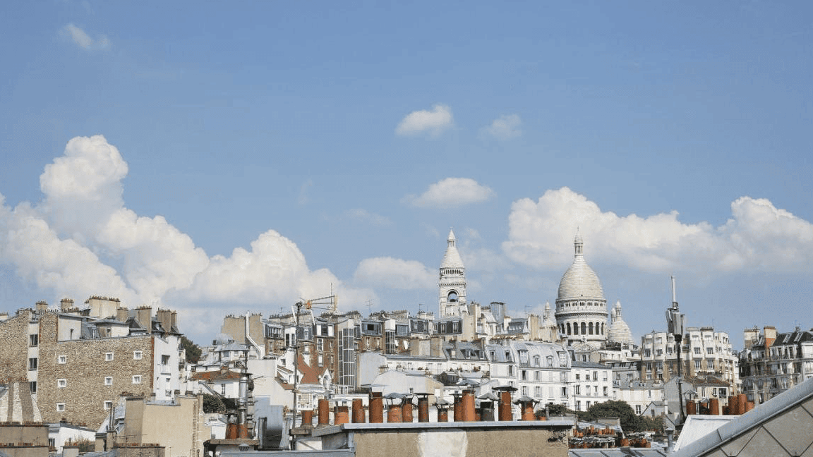 Historical buildings, french arcitecthure and the blue sky, view from Le Rooftop, Terrass Hotel.