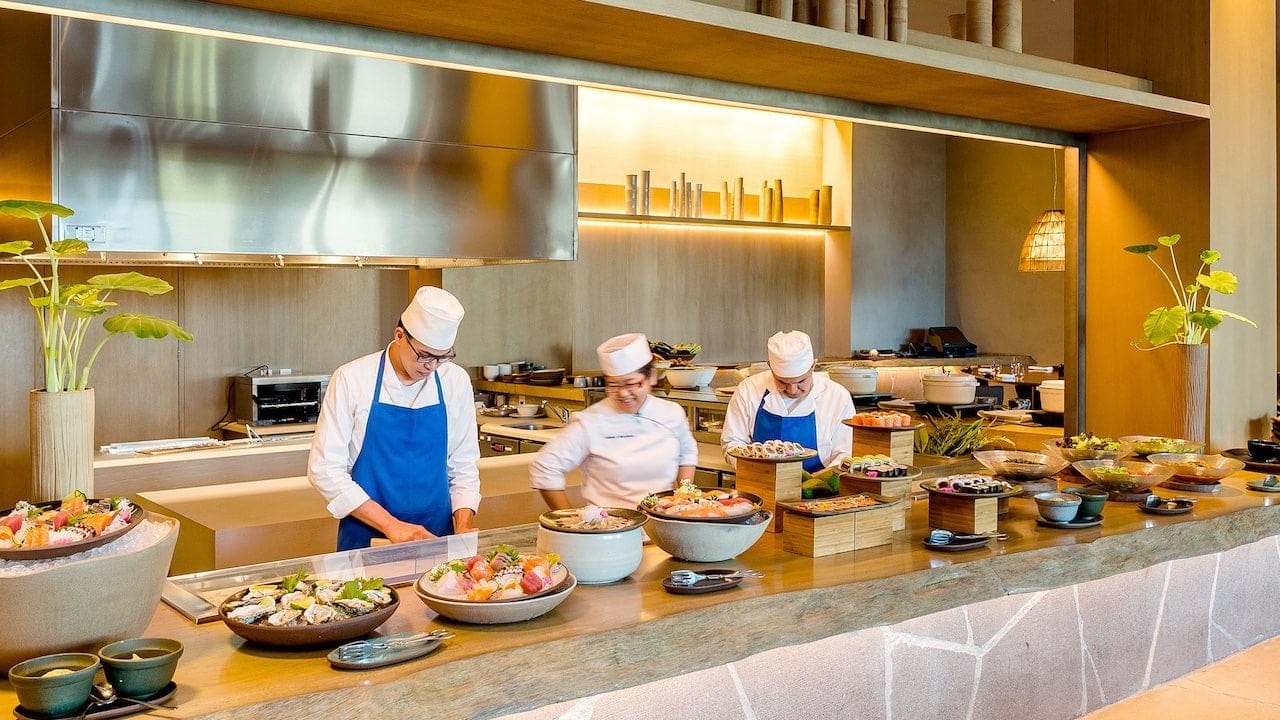 chefs making food at Grand Hyatt Rio de Janeiro's kitchen