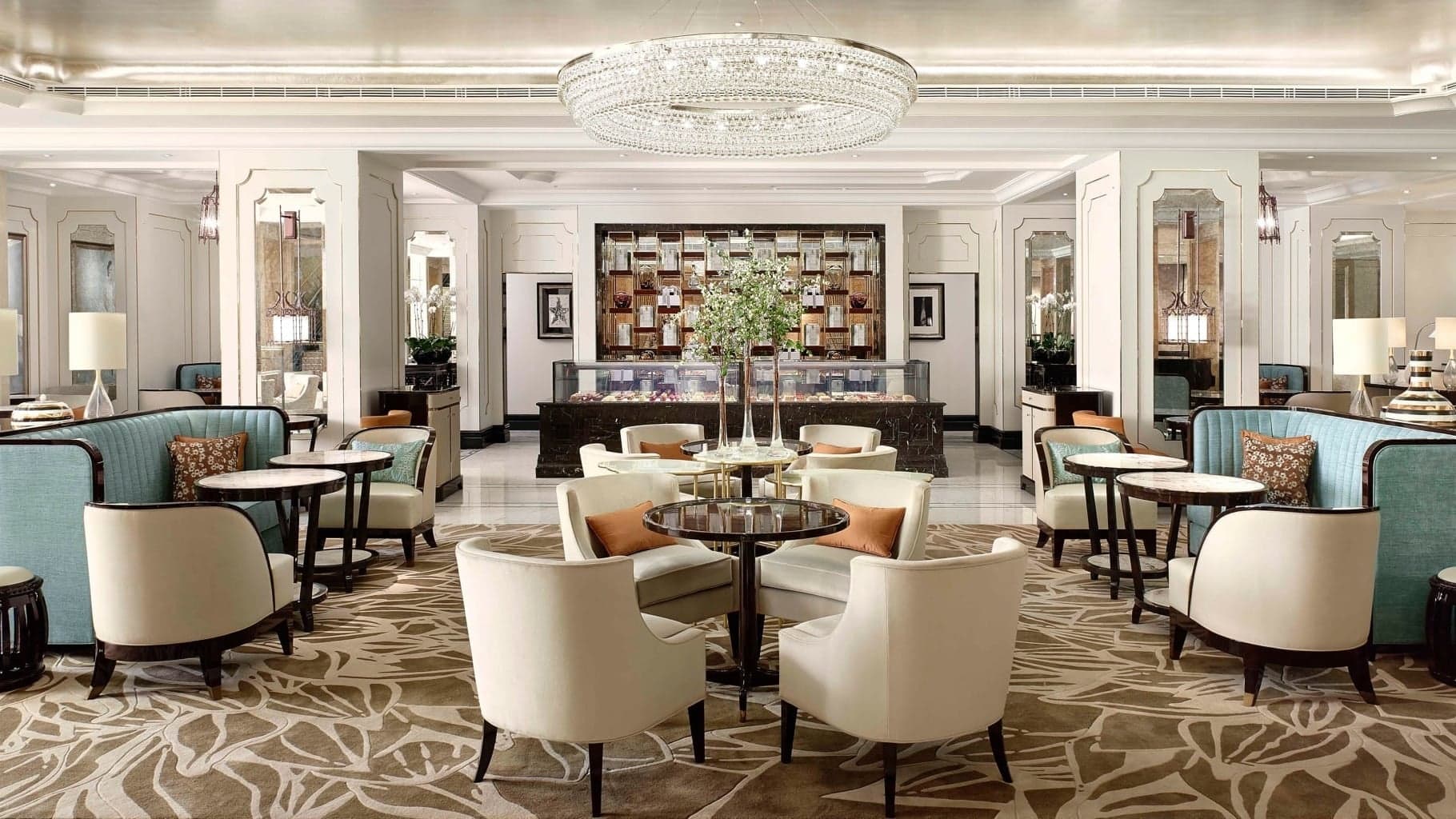 Lunch area with light colours, mainly white decor and bright lightning at The Langham in Hong Kong.