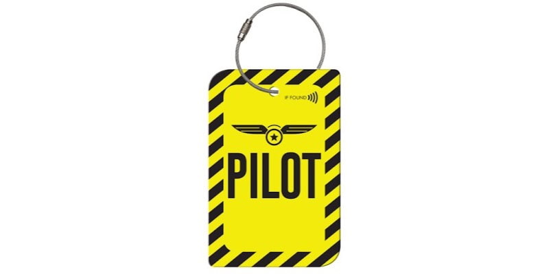 Yellow and black square saying PILOT and a key ring at the top