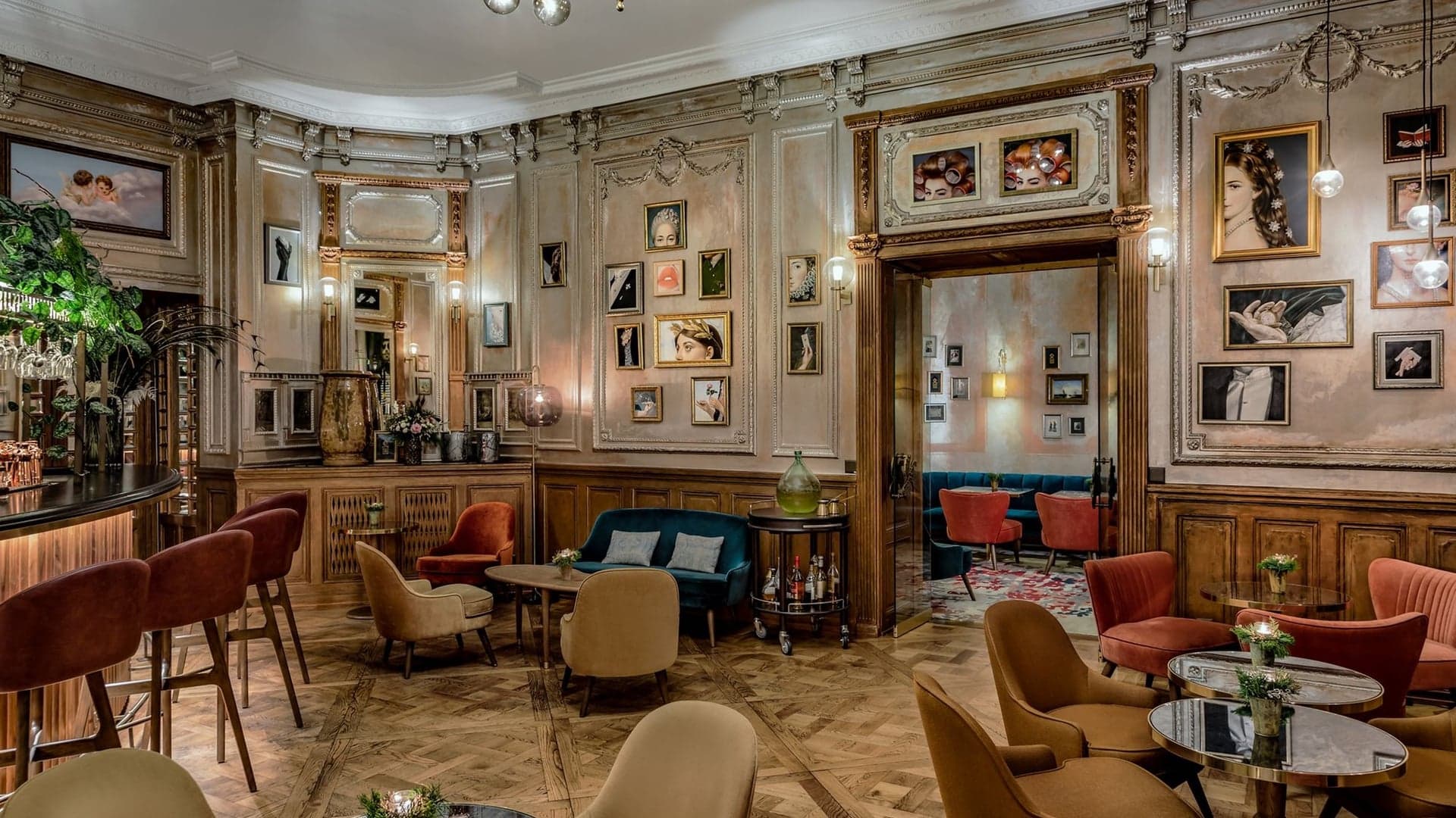 Bar area at The Ritz Carlton Hotel de la pai, Geneva with art on the wall