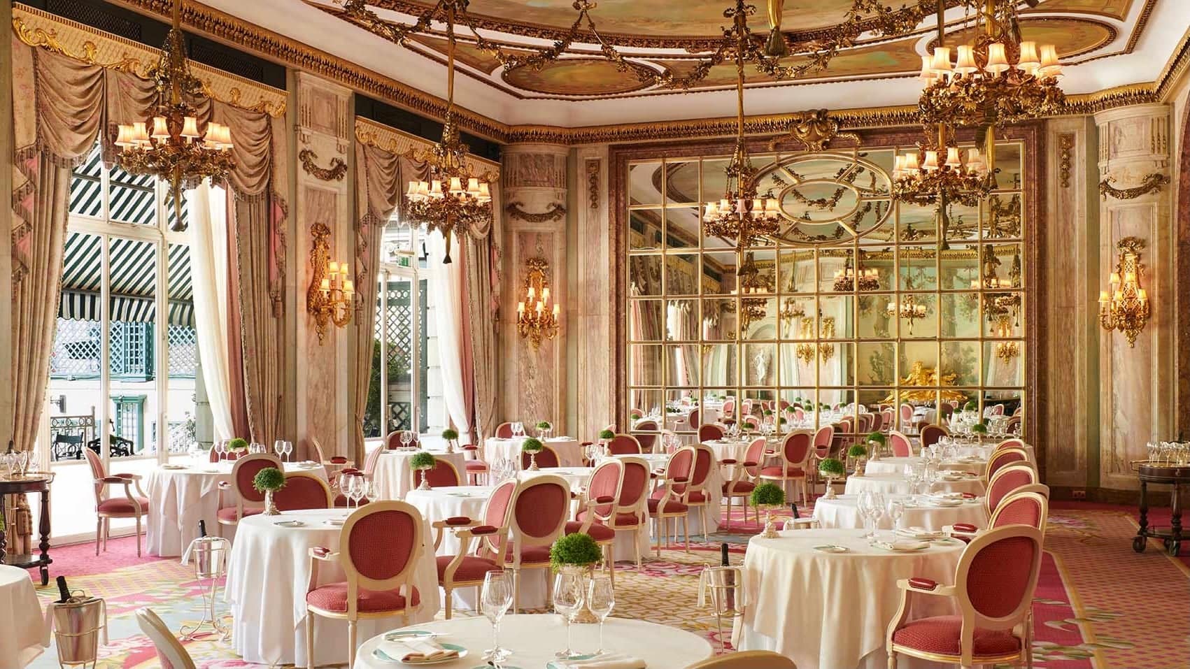 The iconic pink and gold dining area at The Ritz Hotel, in London