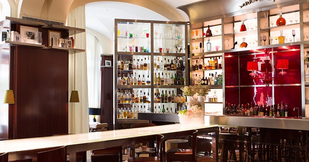 Cocktail closet, seating area inside Le Bar Long.