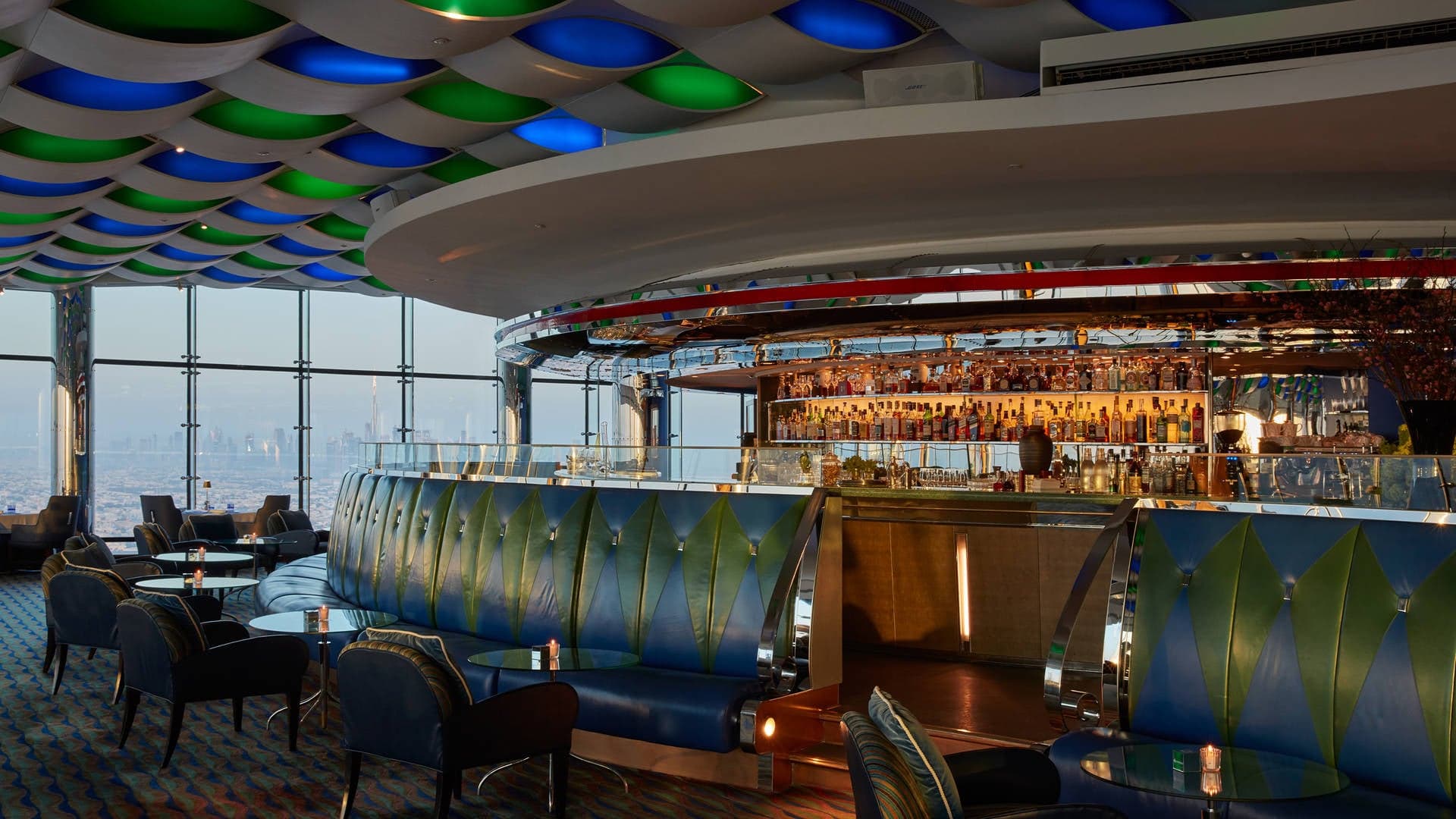 Al muntaha resturant and bar in dubai with blue and green couch