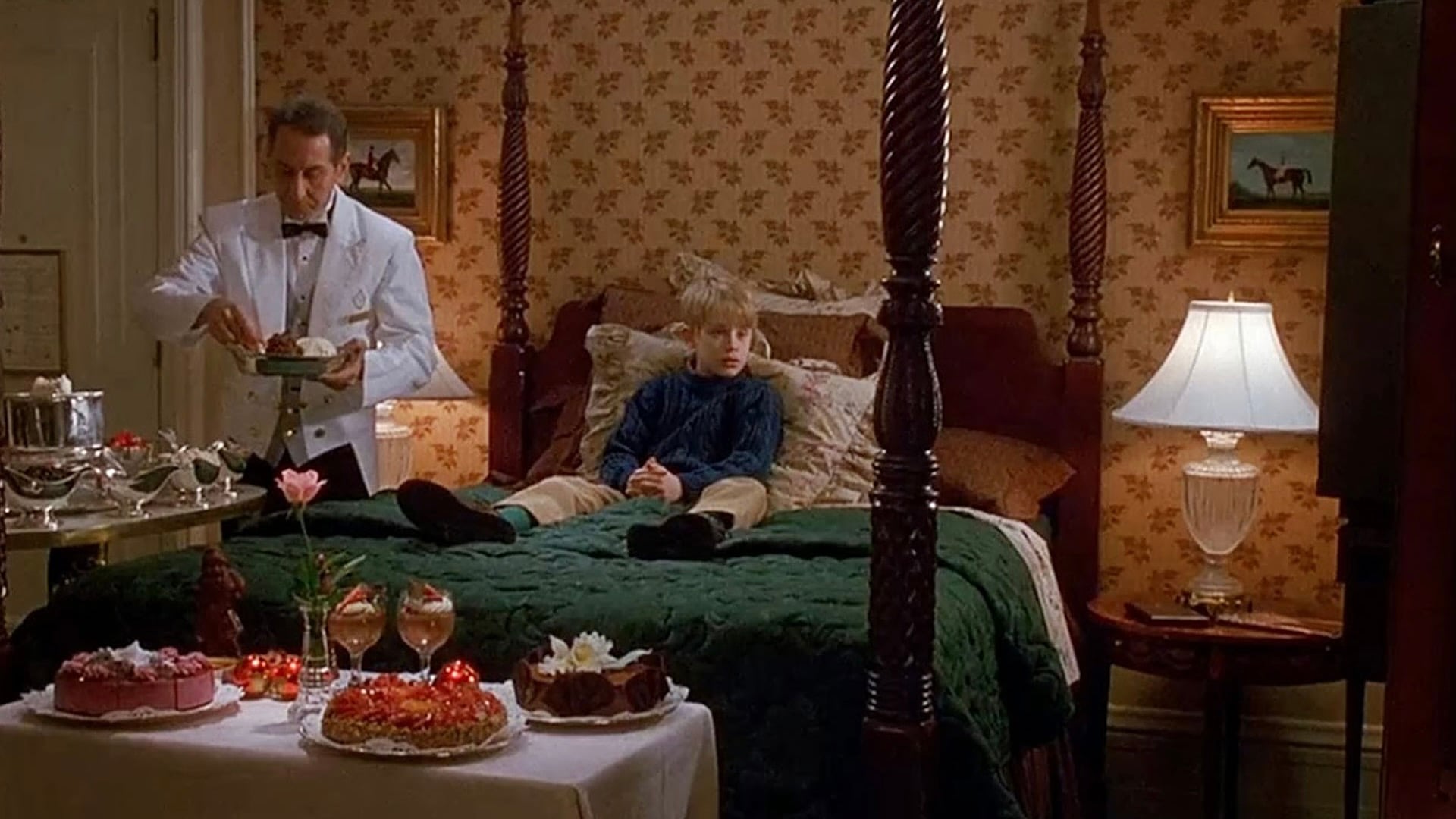 Macaulay Culkin sitting on the bedroom at The Plaza, A Fairmont Managed Hotel in New York