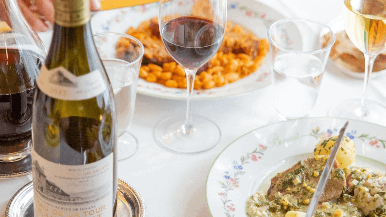 Closeup of food and wine at resturant benoit paris