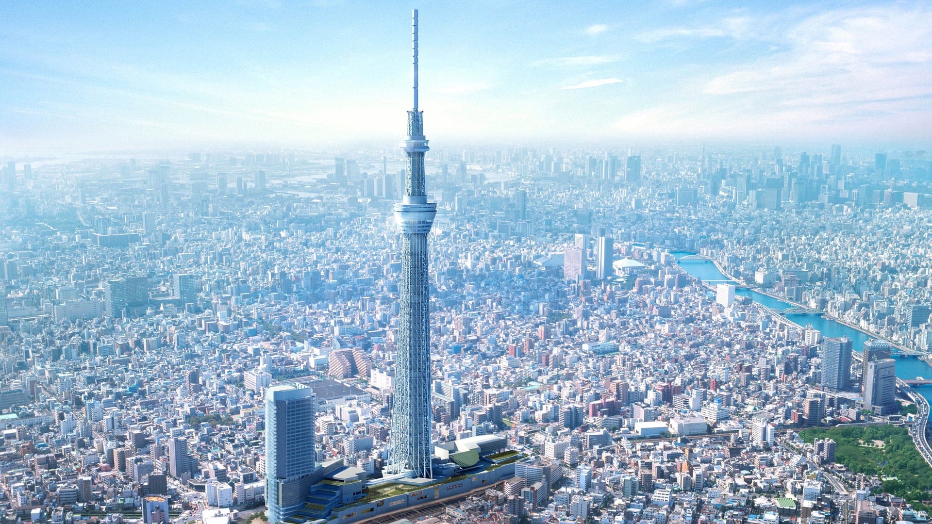 Tokyo Skytree a tall building surrounded by thousands of other buildings.