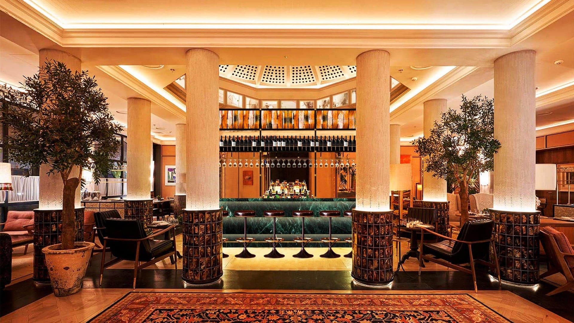 Lounge and bar at BLESS Hotel Madrid with tender lightning