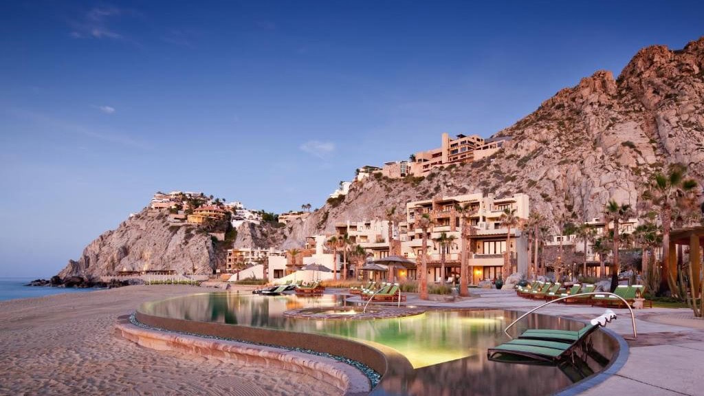 waldorf astoria los cabos pedregal resort with a pool on the beach