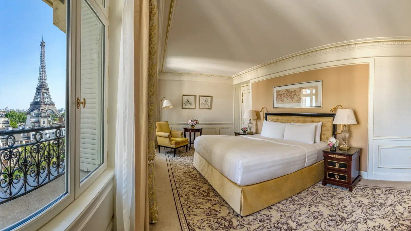 Hotel bedroom at shangri-la hotel paris with a white and gold finish