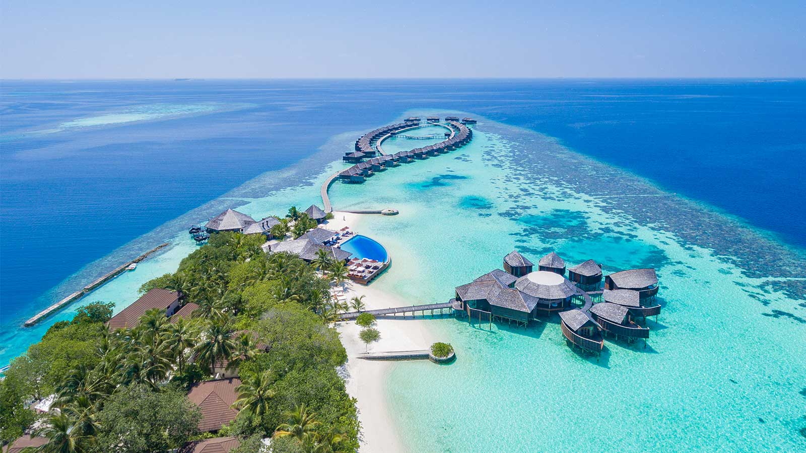 Helicopter view of Lily Beach Resort å Spa at Huvahendhoo, Maldives.