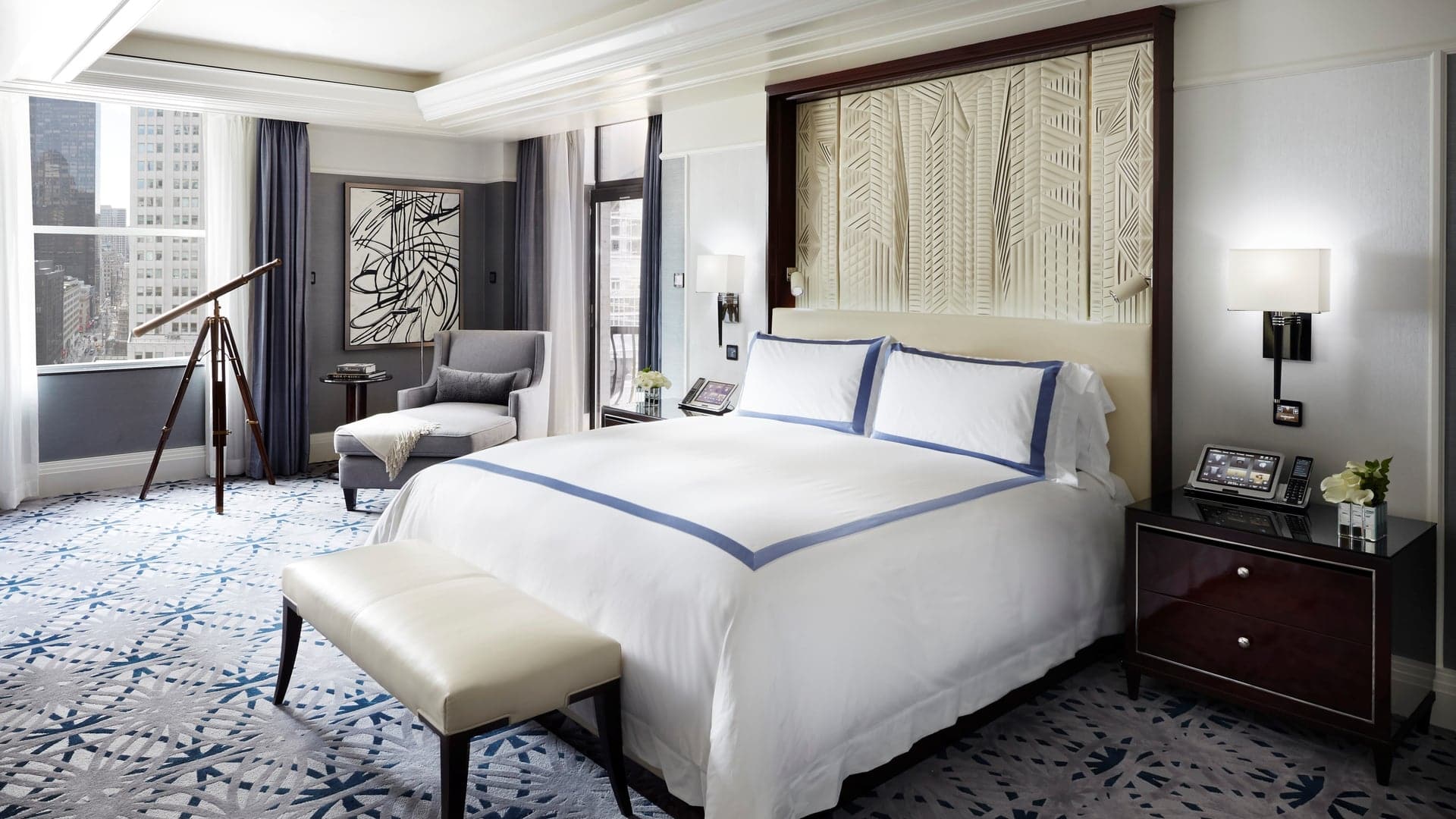 Grand Luxe Room at The Peninsula New York with a black, blue and white design