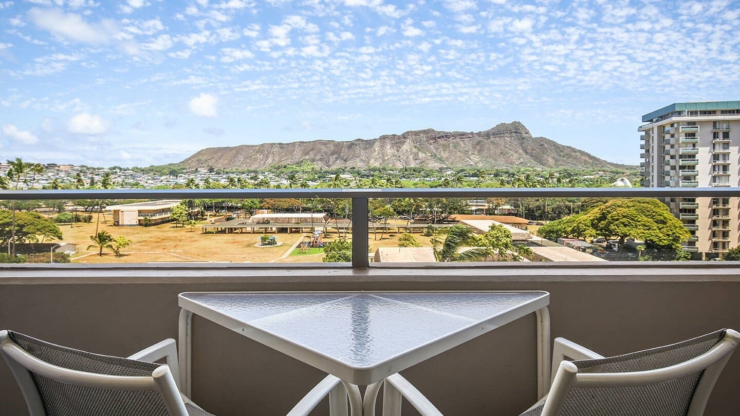 White chairs and view of Aston Waikiki Sunset.