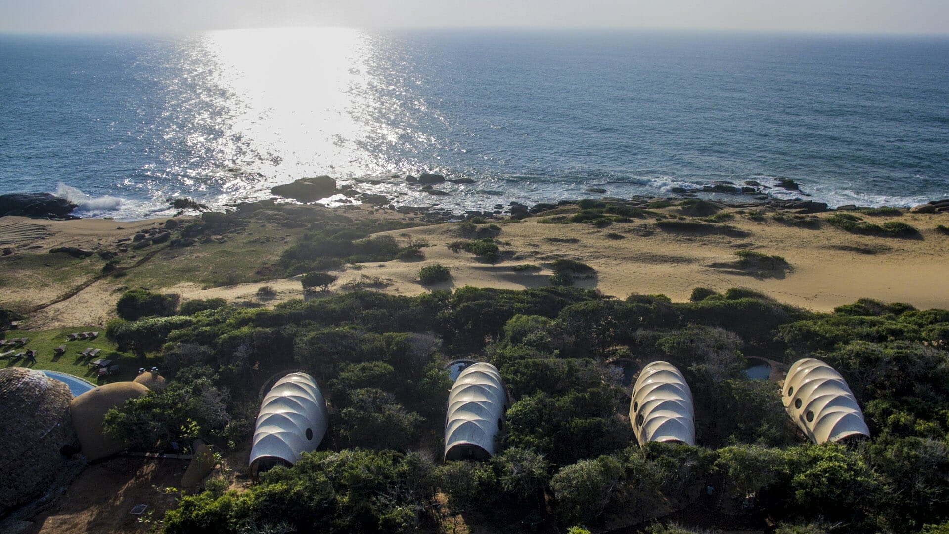 Bird view of Wild Coast Tented Lodge with the ocean