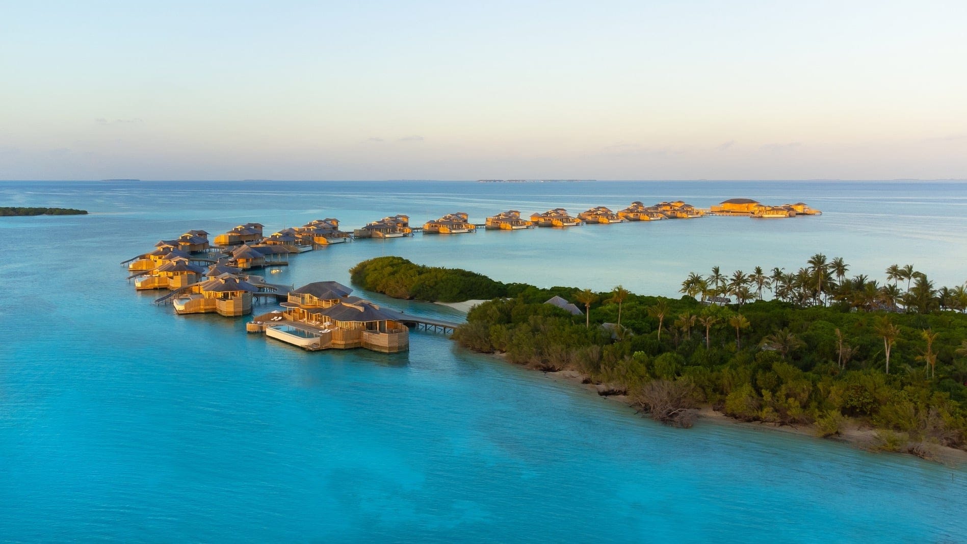 View of island and water suites in Soneva Jani, Noona Atoll.