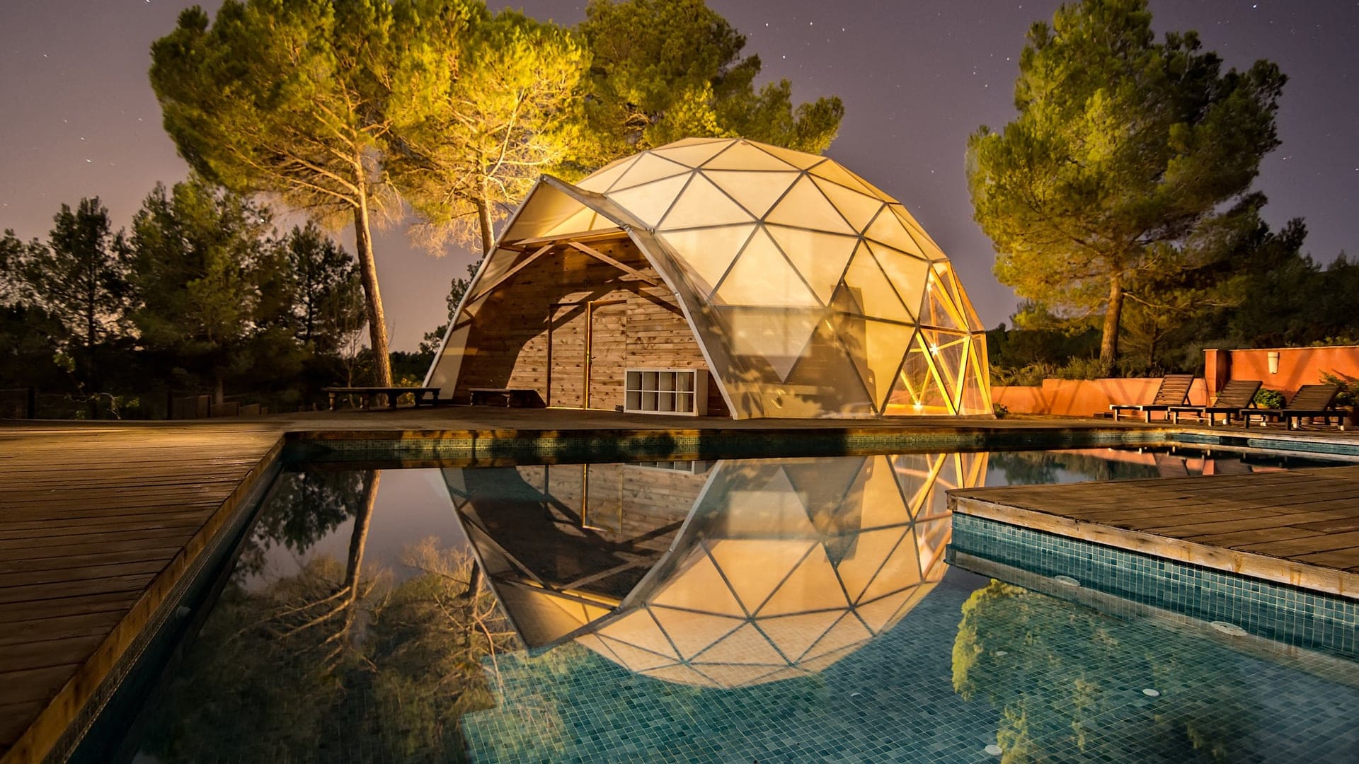 swimming pool with a glass hut.