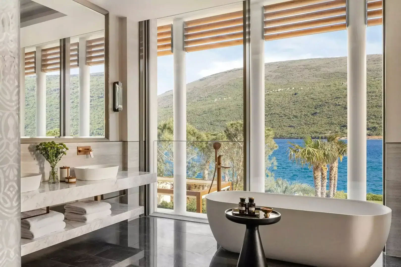 a bathroom at One&Only Portonovi with a view of the sea