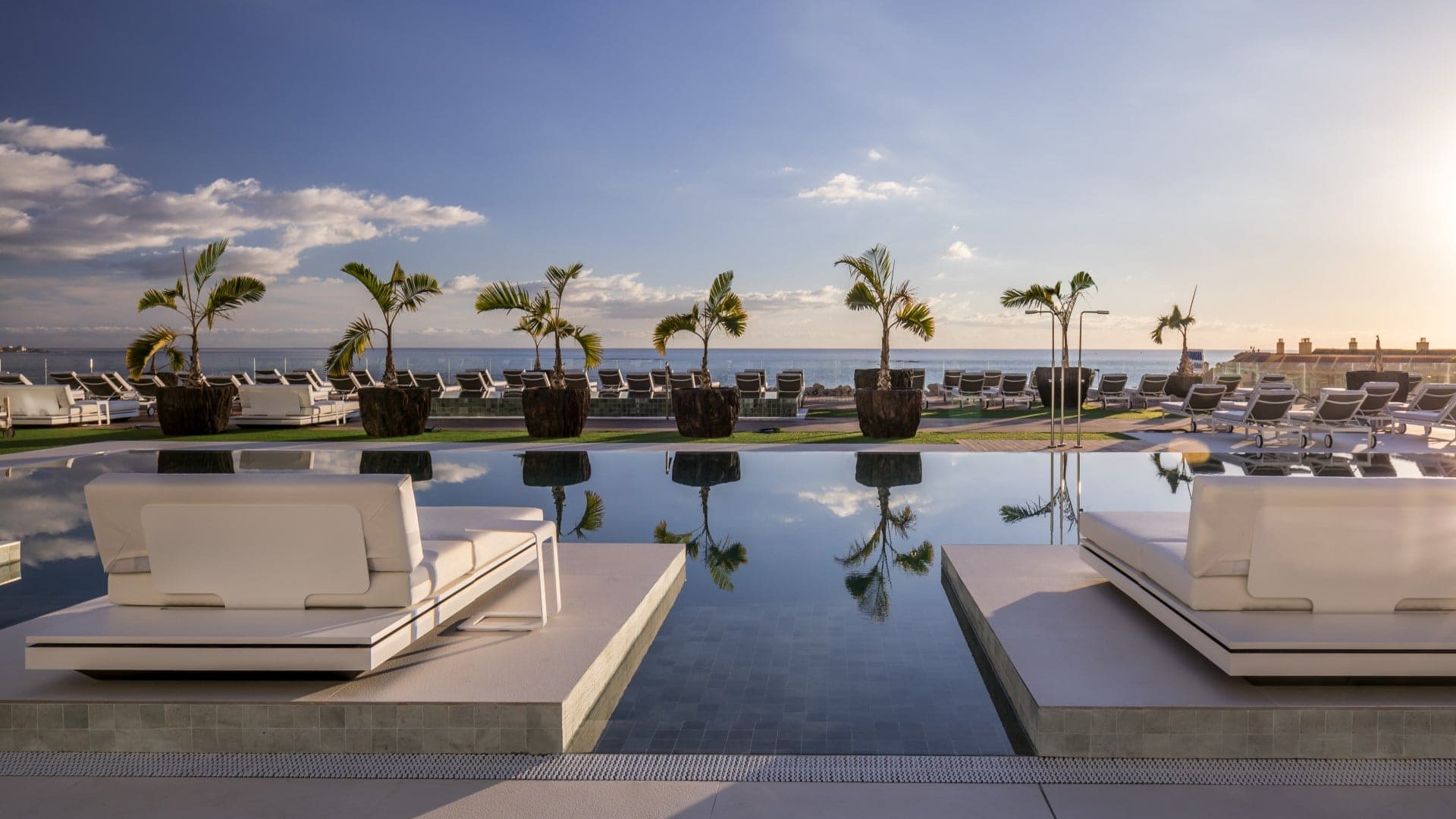 Infinity pool with view of the ocean at Royal Hideaway Corales Suites in Tenerife