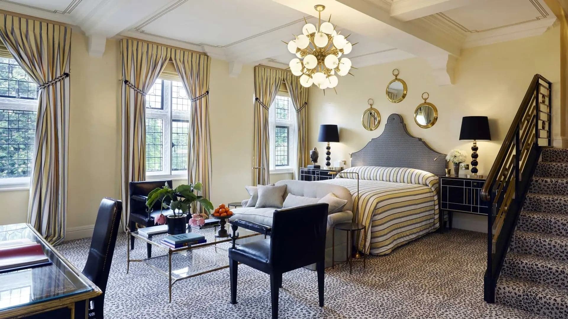 The hermes´suite at the milestone hotel & residences london with black and gold decor