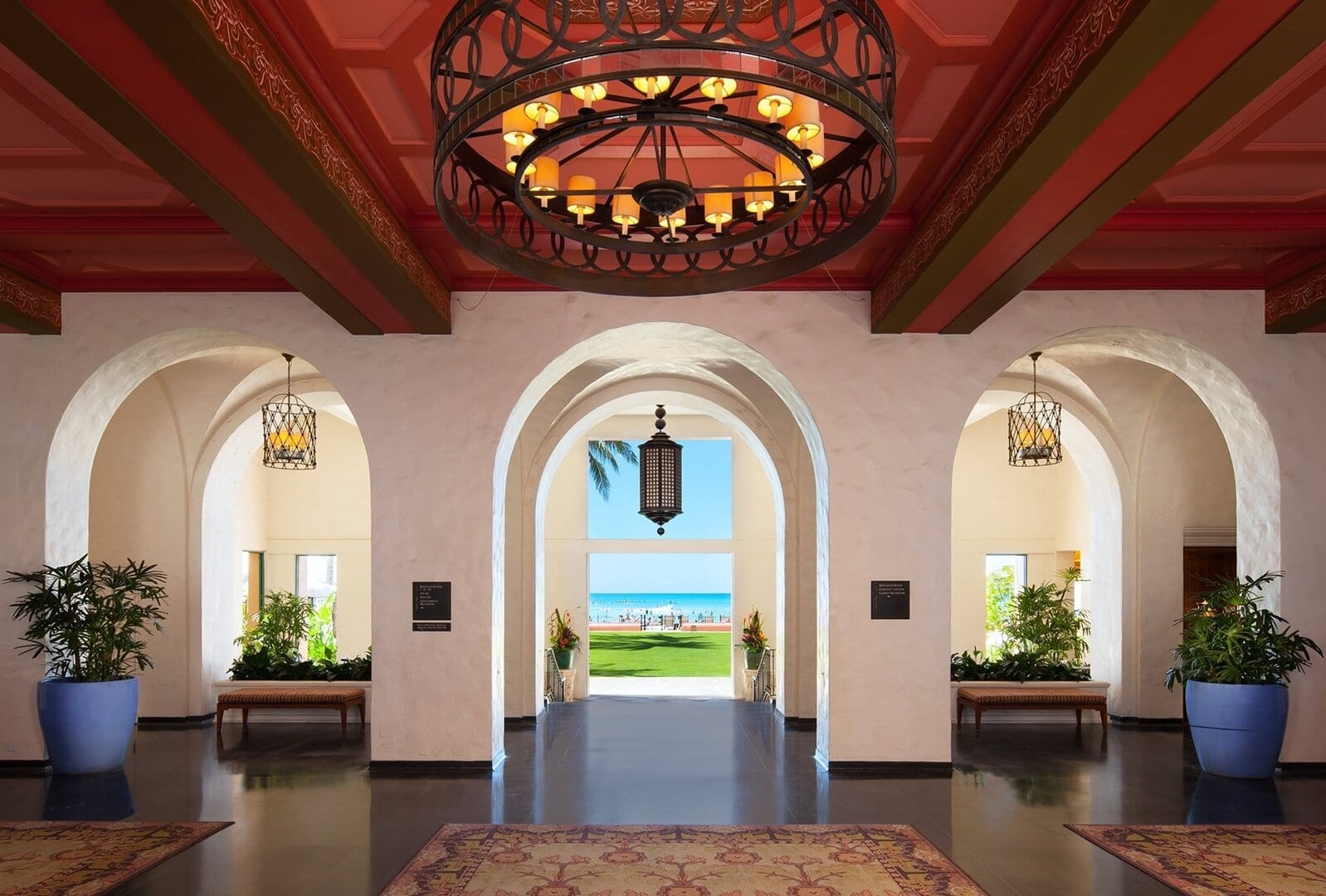 Lounge with door to the beach at The Royal Hawaiian, a Luxury Collection Resort, Waikki.
