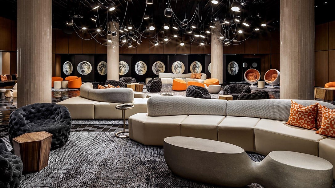Lounge area with grey, black and orange interior at Fairmont The Queen Elizabeth