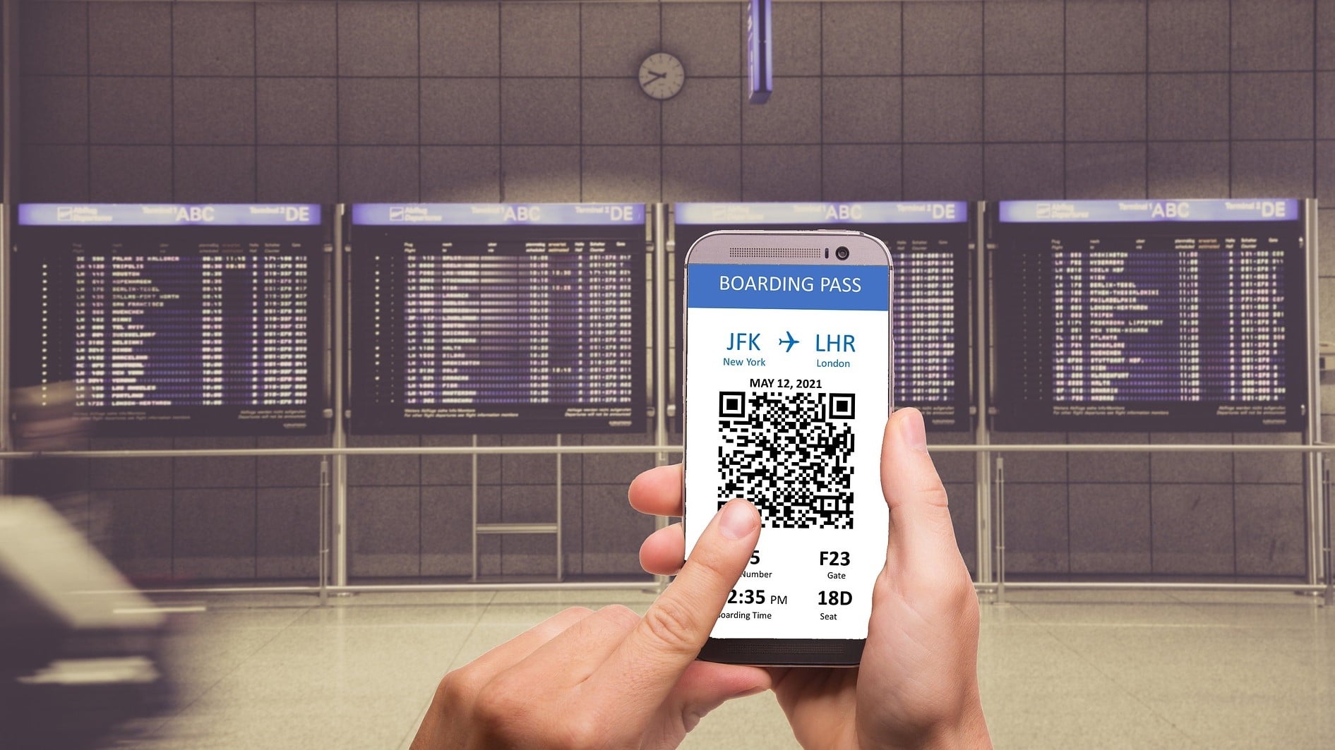 a person boarding using qr code their phone