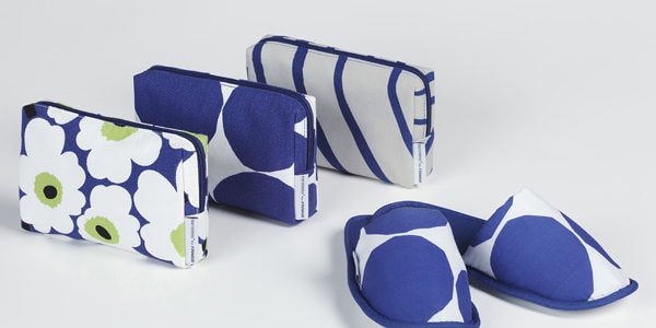 Finnar har introducerat ny necessär i affärsklass från Marimekko och L:A Bruket