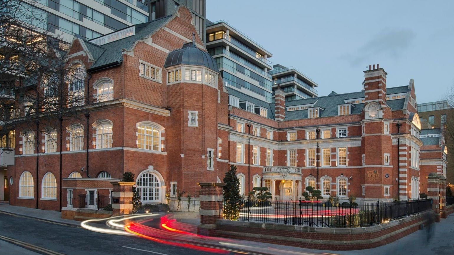 View of the Lalit london, With a stone brick finish.