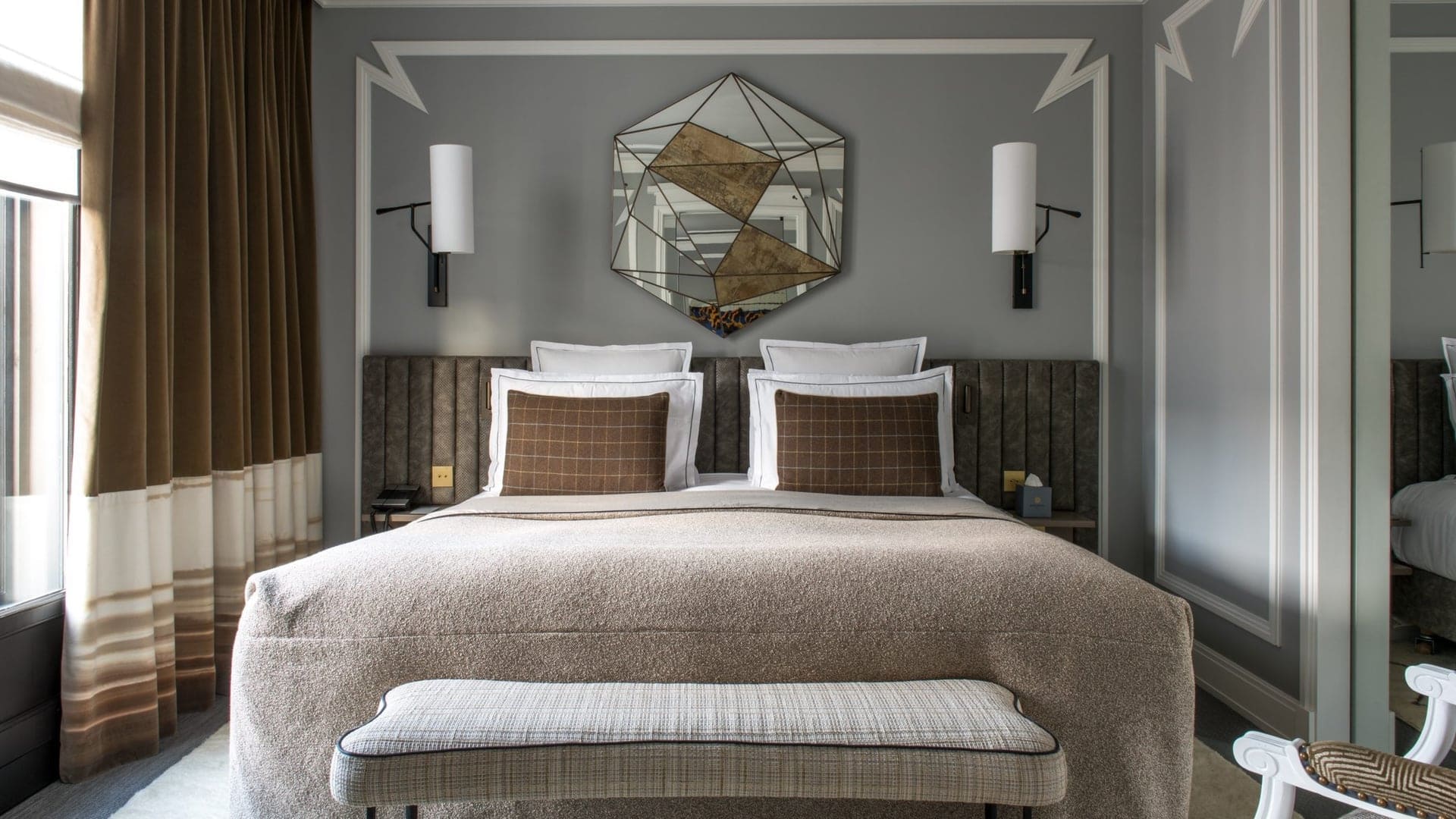 hotel room with king sized bed at nolinski Paris