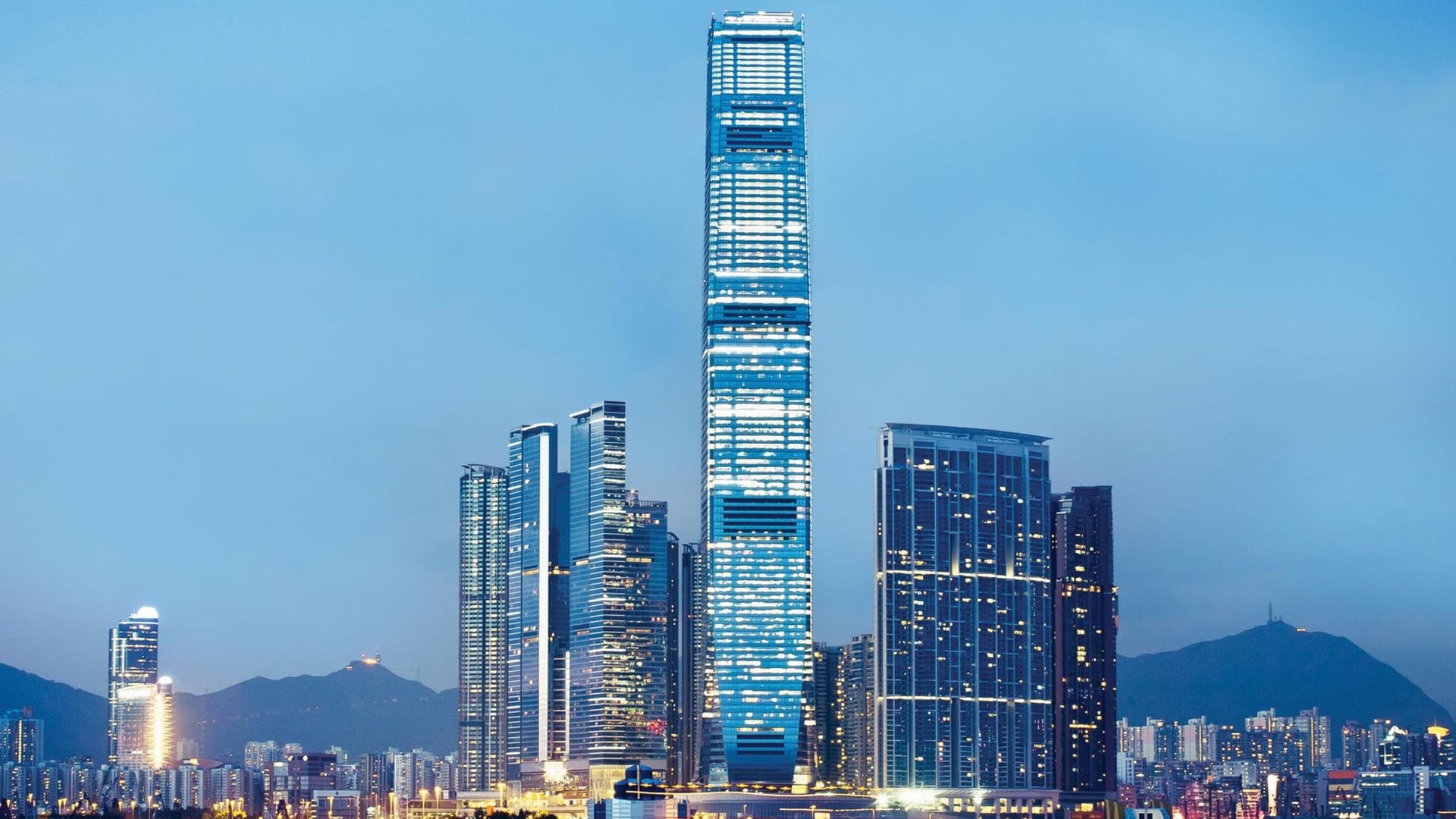 Evening time The Ritz-Carlton in Hong Kong stands tall.