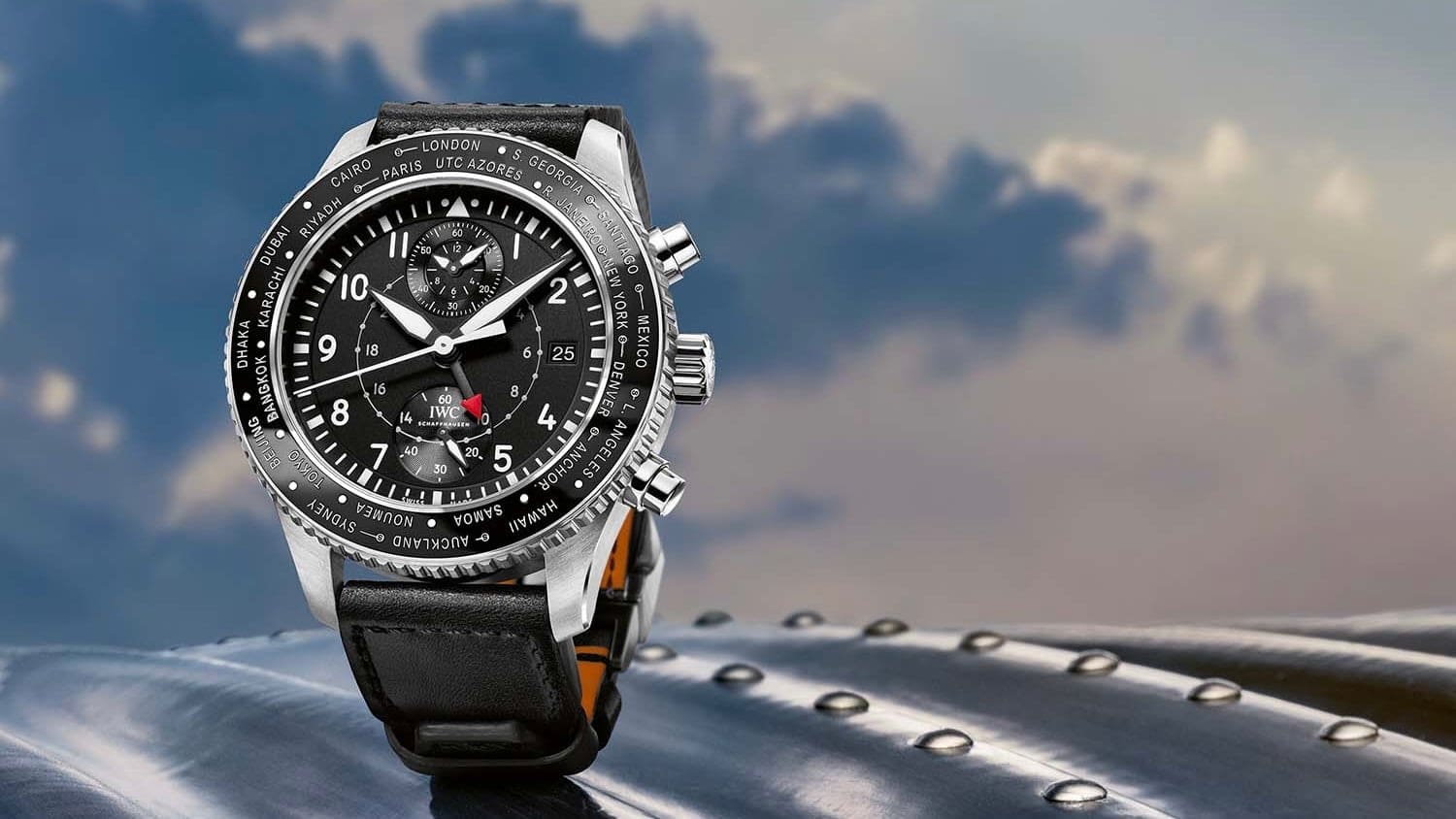 A CGI of a IWC Pilot's Watch Timezoner Chronograph in the air.