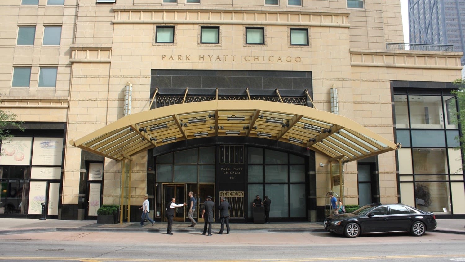 Outside the entrance of Park Hyatt in Chicago at a sunny day