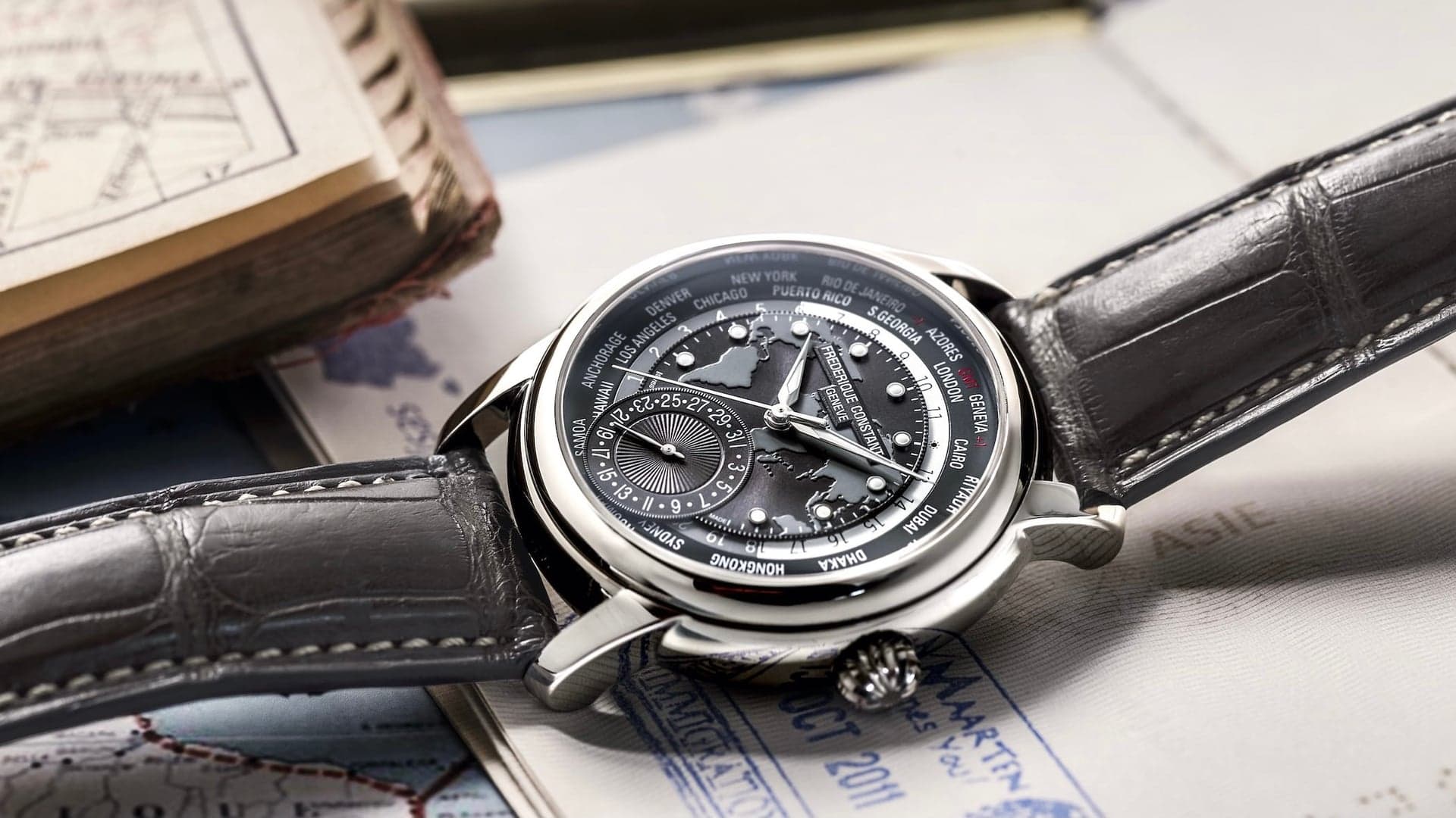 A black designed Frederique Constant Classics Worldtimer Manufacture travel watch.