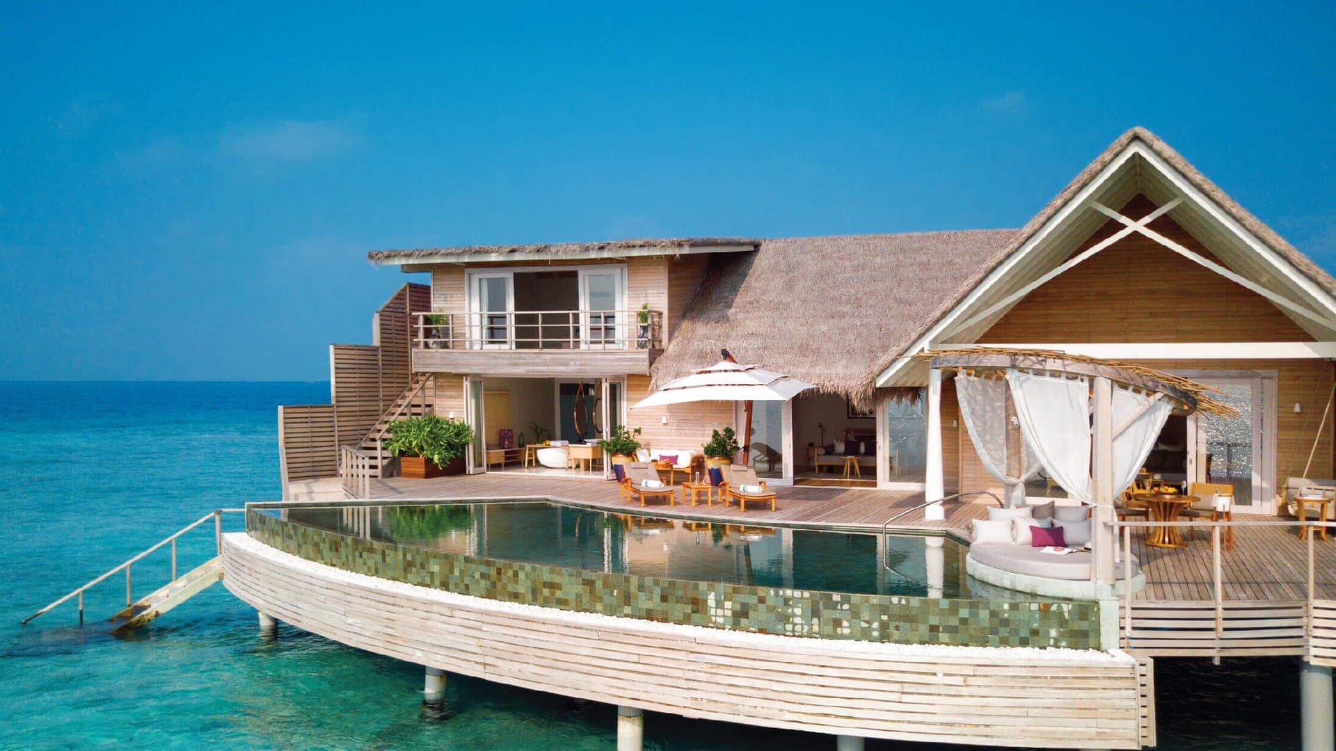 Private suite with pool and staircase to the ocean at Miladhoo Maldives.