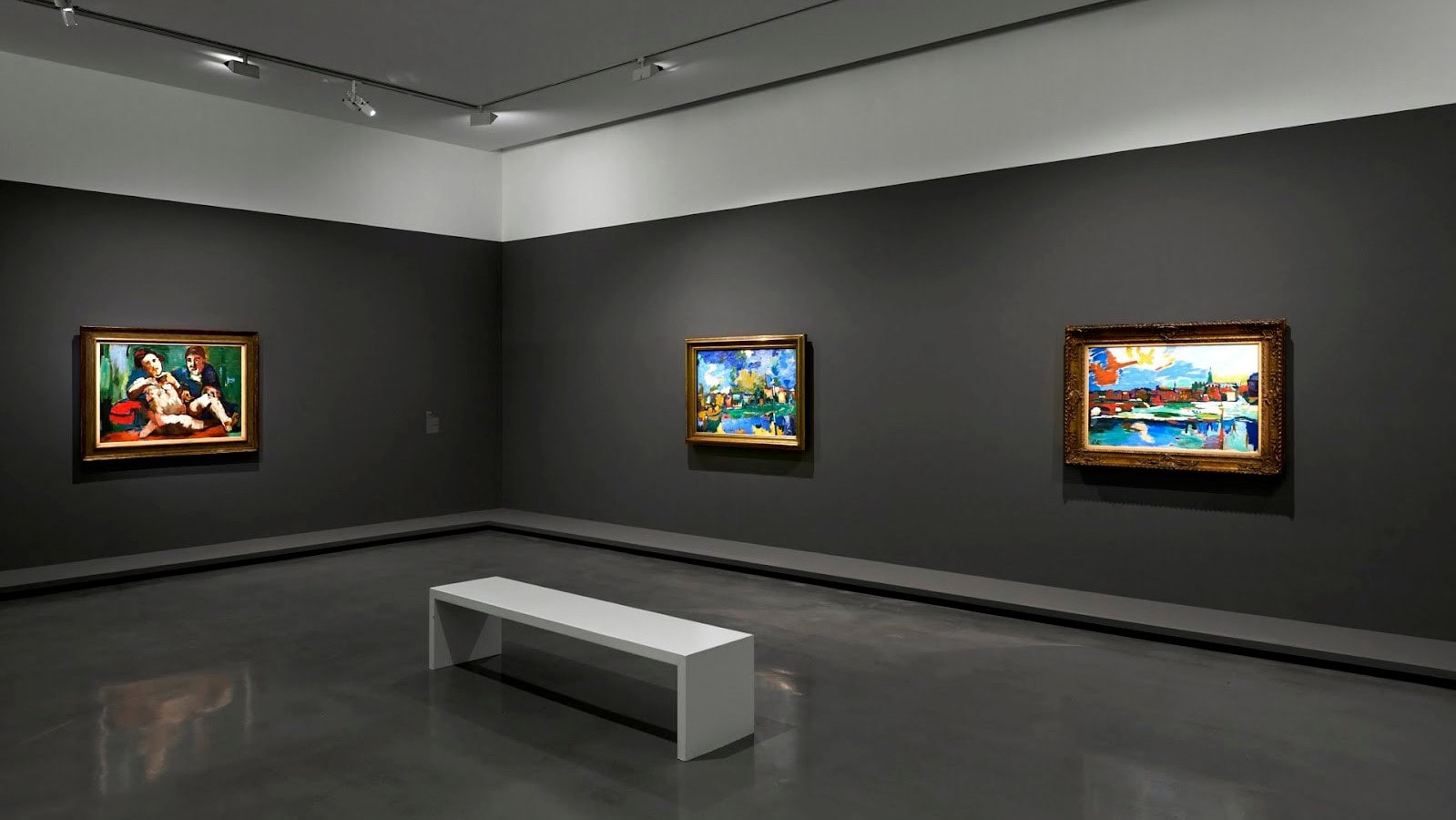 Three paintings on grey walls in Paris Museum of Modern Art.